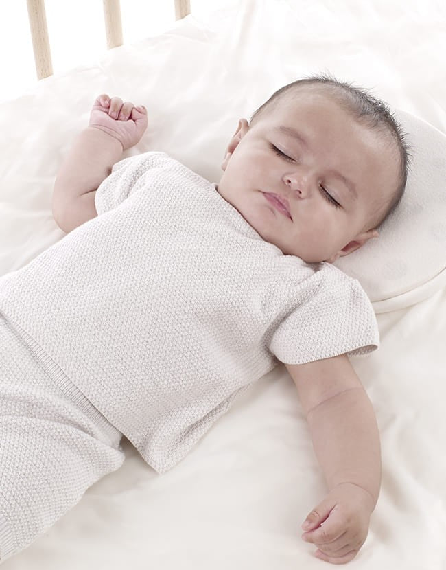 Cuscino ergonomico 2 in 1 per culla e portabebè contro plagiocefalia Jané