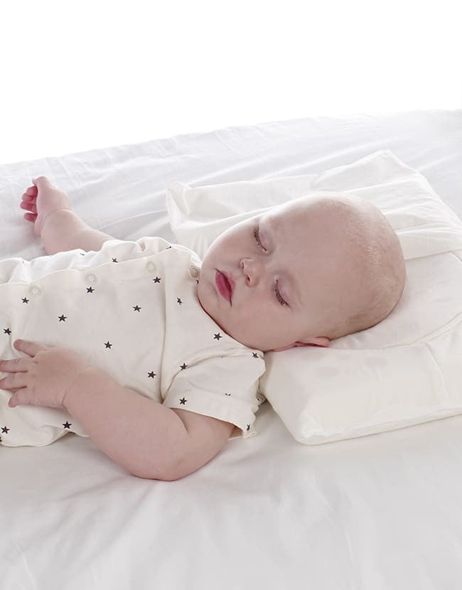Cuscino ergonomico 2 in 1 per culla e portabebè contro plagiocefalia Jané