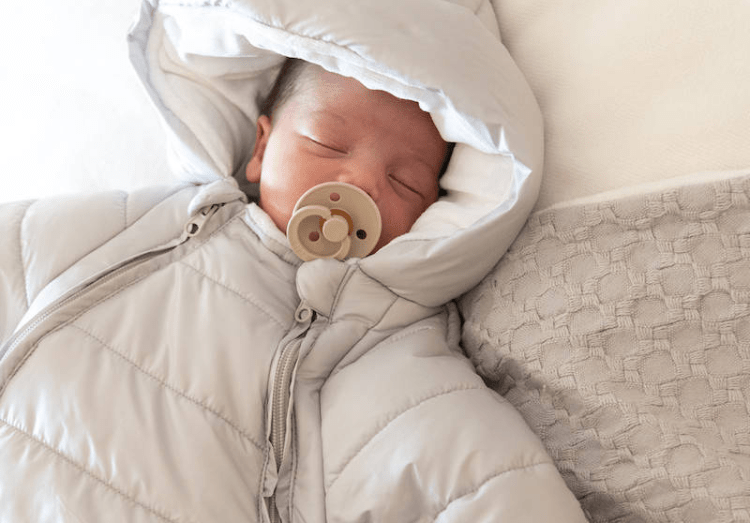 Tuta da neve neonato: sopravvivere all'Inverno (e alla prima settimana bianca!)